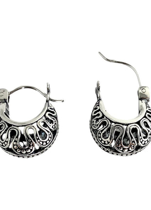 Sterling silver hoop earrings.