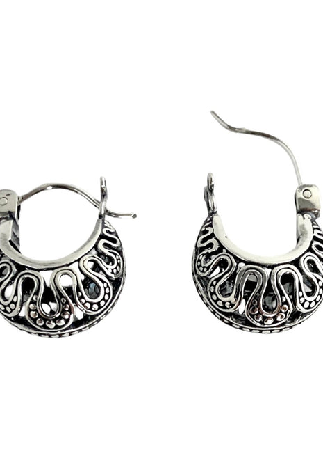 Sterling silver hoop earrings.