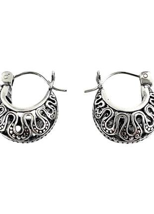 Sterling silver hoop earrings.