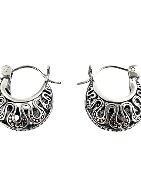 Sterling silver hoop earrings.