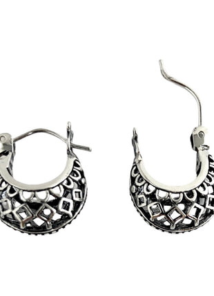 Sterling Silver huggie hoop earrings.