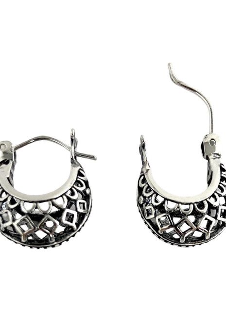 Sterling Silver huggie hoop earrings.